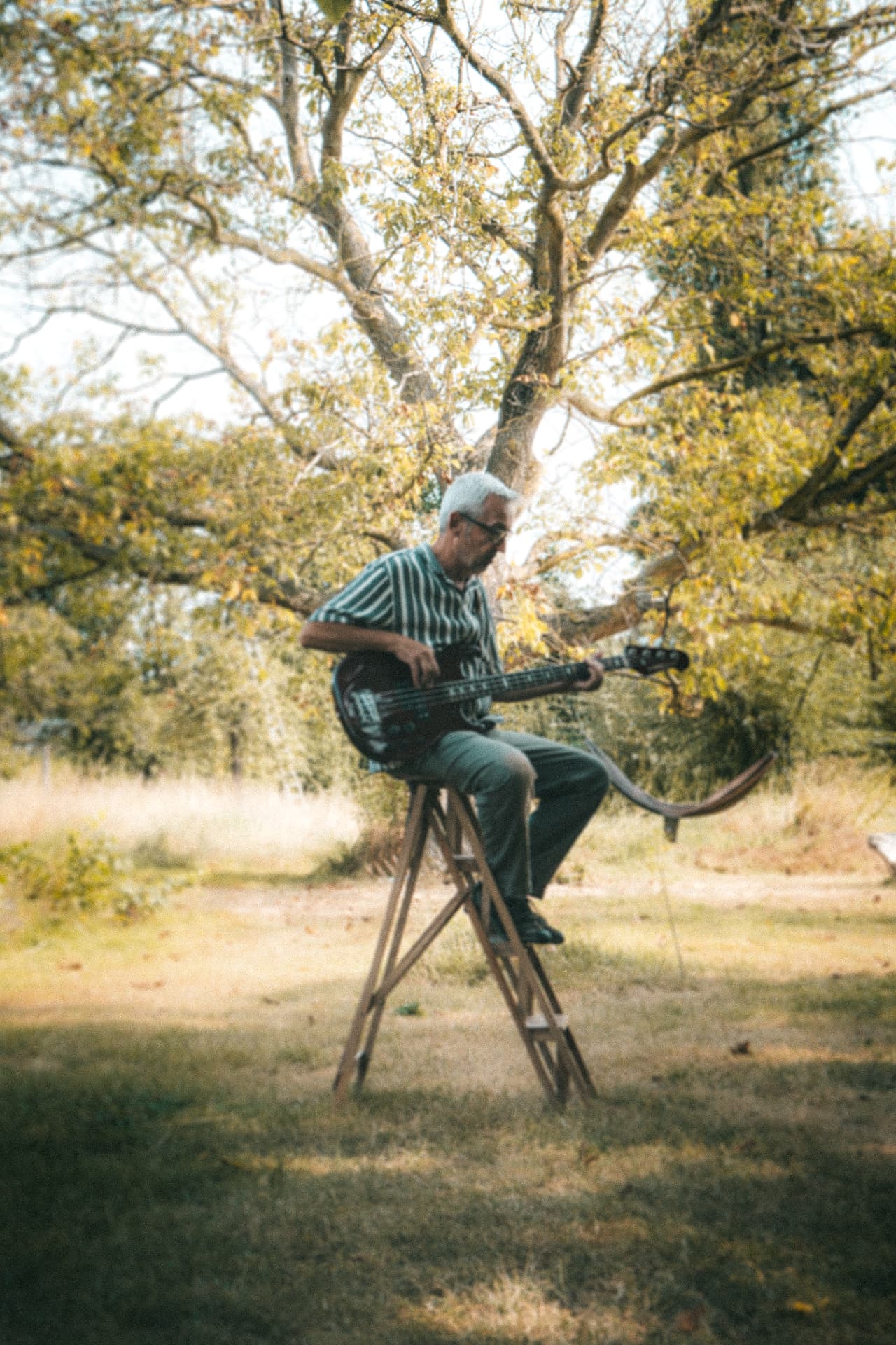 Lo Meulen in a hammock beneath the walnut tree